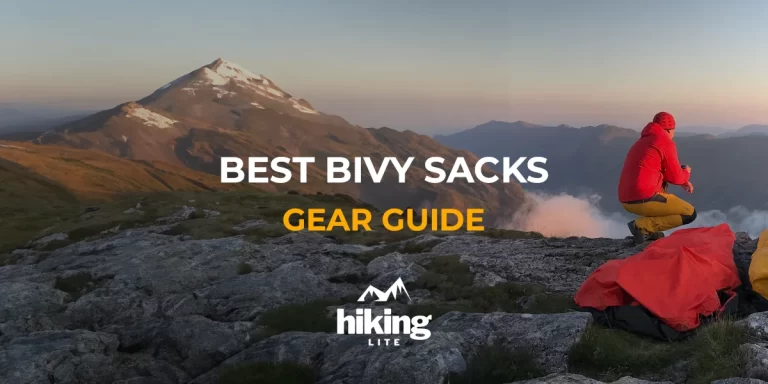 Best Bivy Sacks: A camper next to his bivy, enjoying a morning coffee on a gorgeous mountain