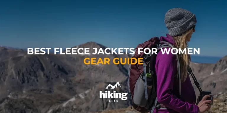 Best Fleece Jackets for Women: A female hiker in the mountains on a sunny day