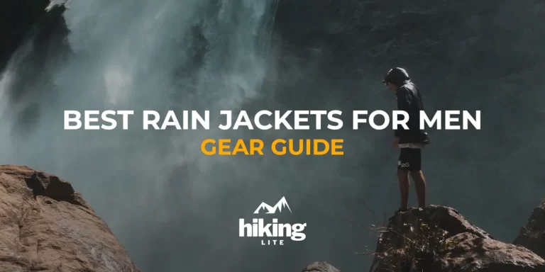 Best Rain Jackets for Men: A hiker standing in front of a waterfall, wearing a rain jacket in Sri Lanka