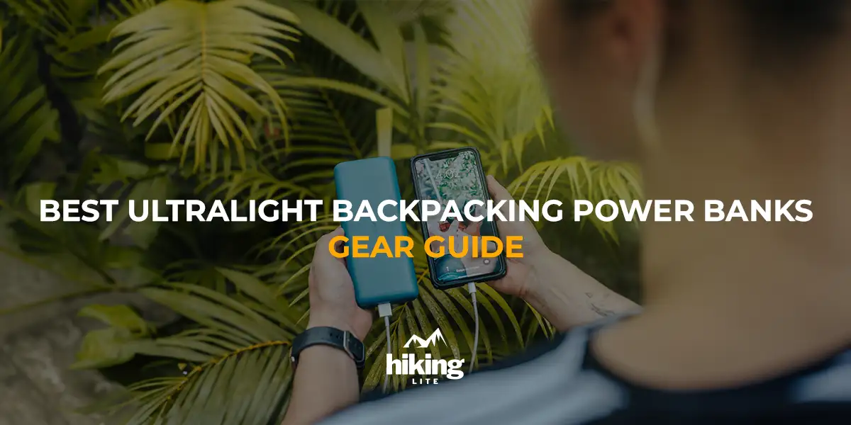 Person holding a phone and a backpacking power bank