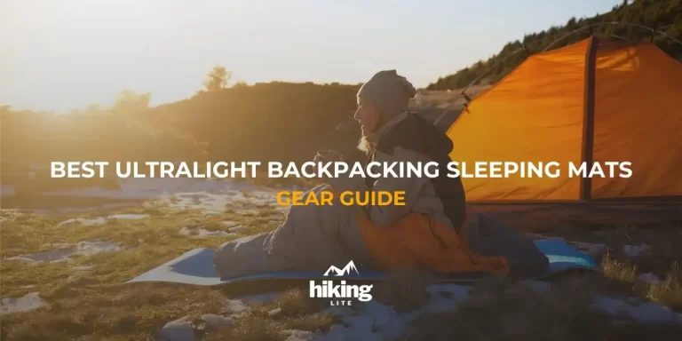 Backpacking Sleeping Mats: Female hiker on chilly morning with backpacking sleeping mat