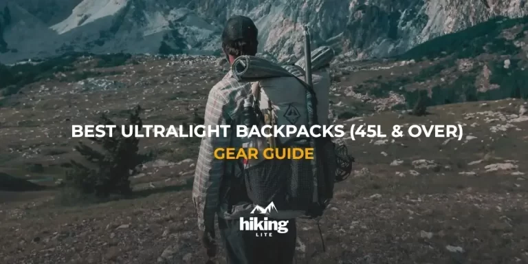 Hiker in scenic snowy mountains with an ultralight hiking backpack
