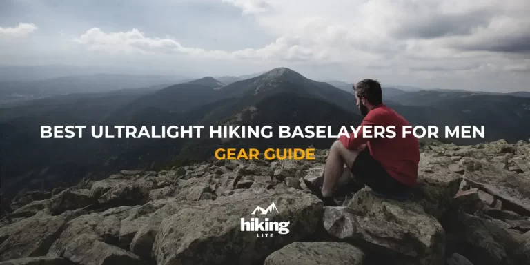 Hiking Baselayers: Sitting hiker in the mountains on rocky ground wearing an ultralight hiking baselayer