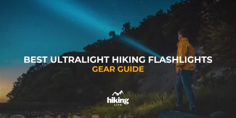 Best Ultralight Hiking Flashlight: Person holding a hiking flashlight, illuminating the stars
