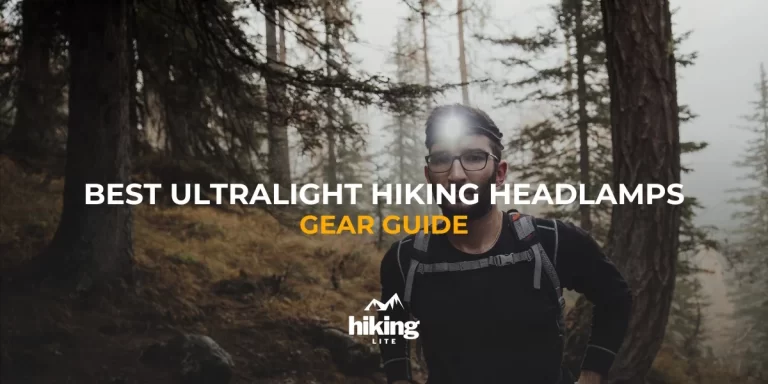 Backpacker in a forest wearing an ultralight hiking headlight