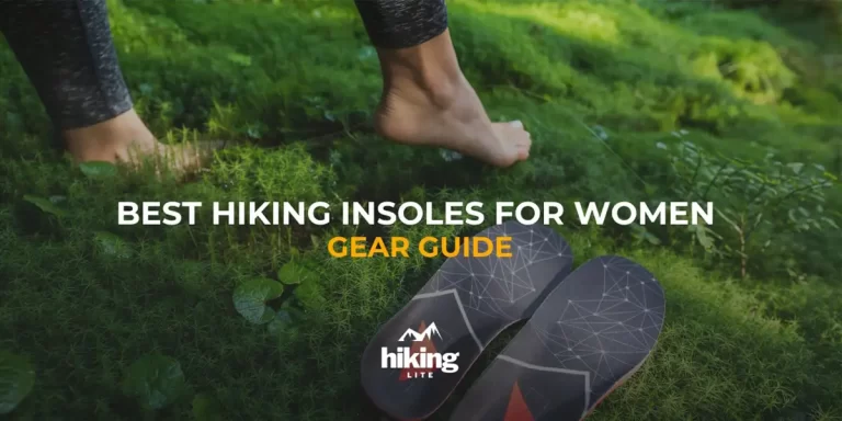Female hiker's legs in the grass next to ultralight hiking insoles