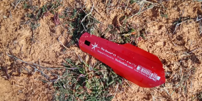 Ultralight camping trowel on the ground