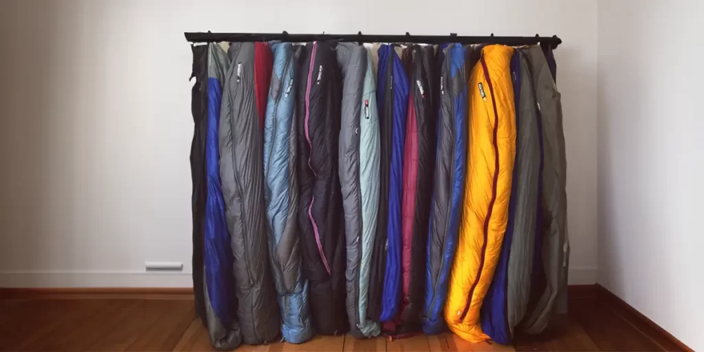 How to pack a sleeping bag: long-term stored sleeping bags on a rack