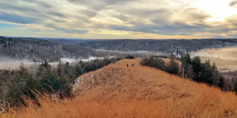 Ultralight Backpacking in Iowa: Hikers on a low hill trail in Iowa