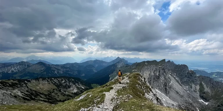 Ultralight Backpacking in Germany: A backpacker climbing a mountain in Germany