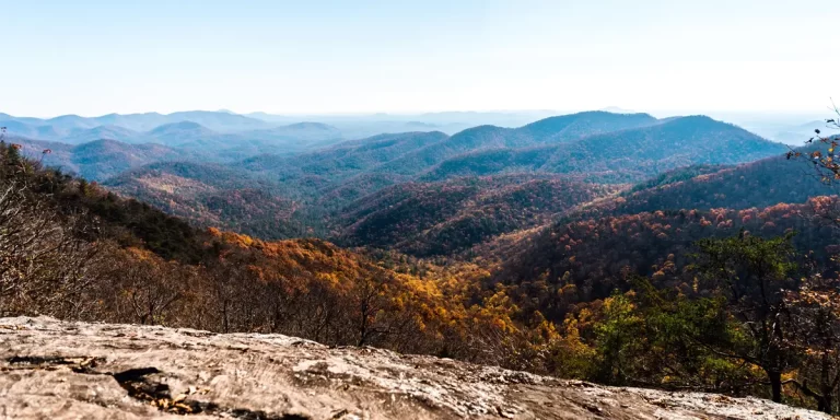Backpacking in Georgia offers a scenic mountain view along a hiking trail