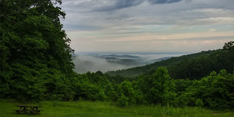 The Brown County State Park Overlook offers a breathtaking view of the landscape during the tranquil moments after sunset